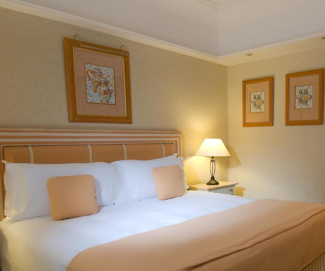 Отель Millennium Plaza Downtown, Дубай Экстерьер фото A bedroom at the hotel