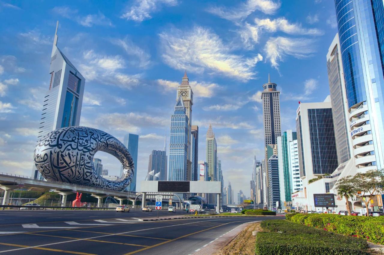 Отель Millennium Plaza Downtown, Дубай Экстерьер фото Al-Shaab skyline