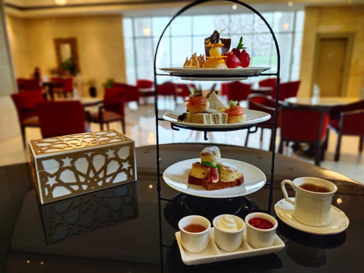 Отель Millennium Plaza Downtown, Дубай Экстерьер фото Afternoon tea at the Grand Hyatt Hotel, Mumbai